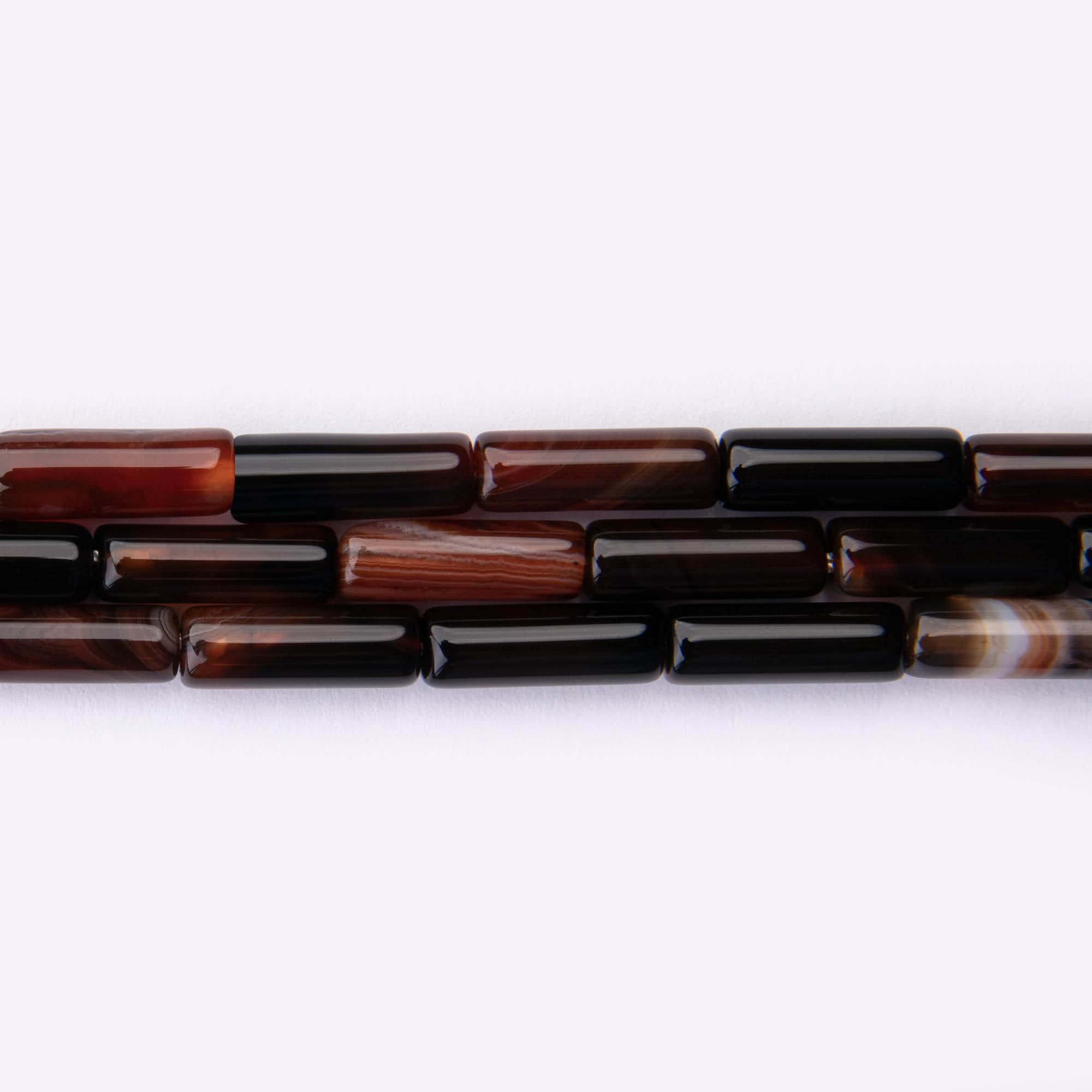 02225-LQ Black and Red Agate Natural Stone 4×13mm Cylinder Polished - Image 1