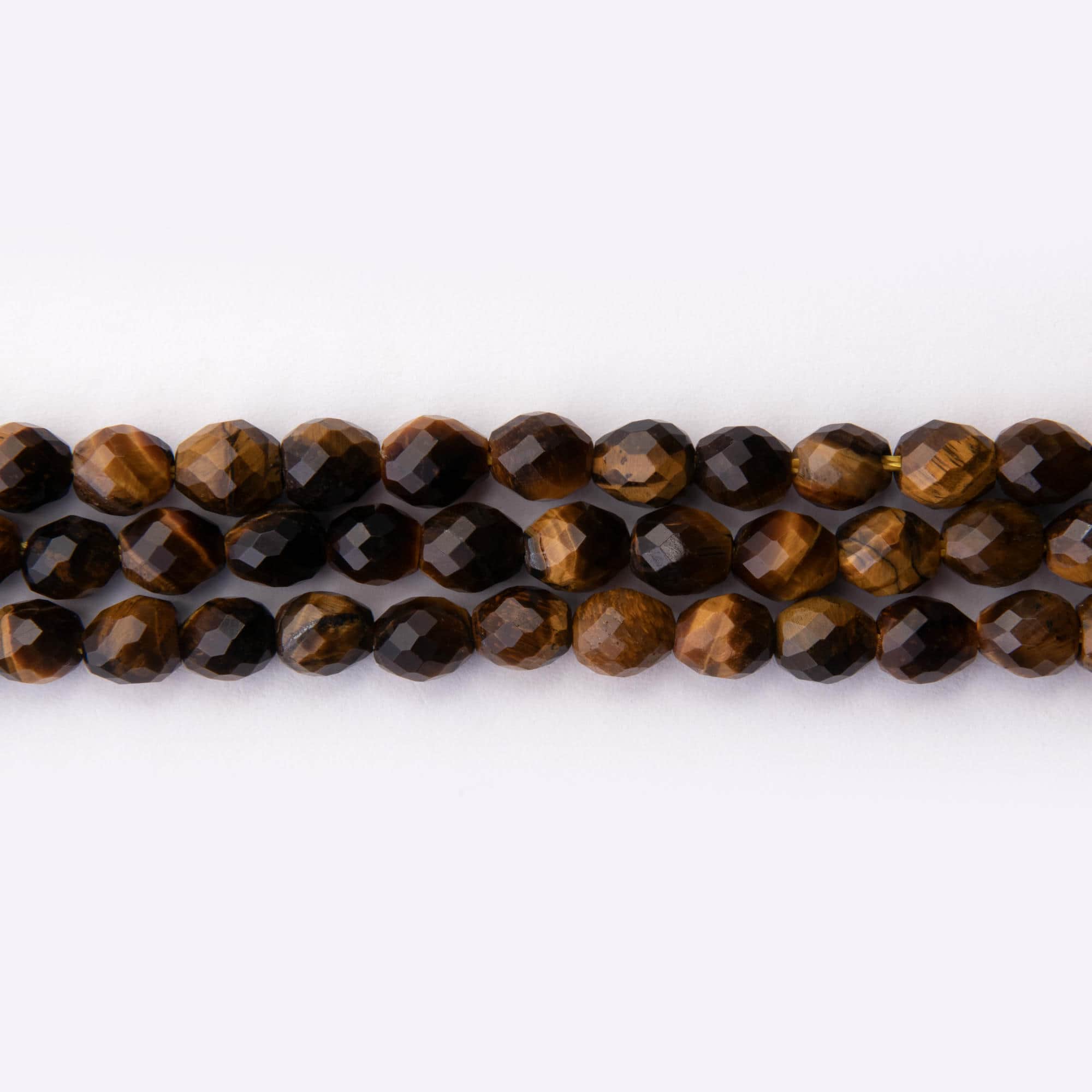 02284 LQ Tiger Eye Natural Stone 5×6mm Oval Sparkling Faceted - Image 1