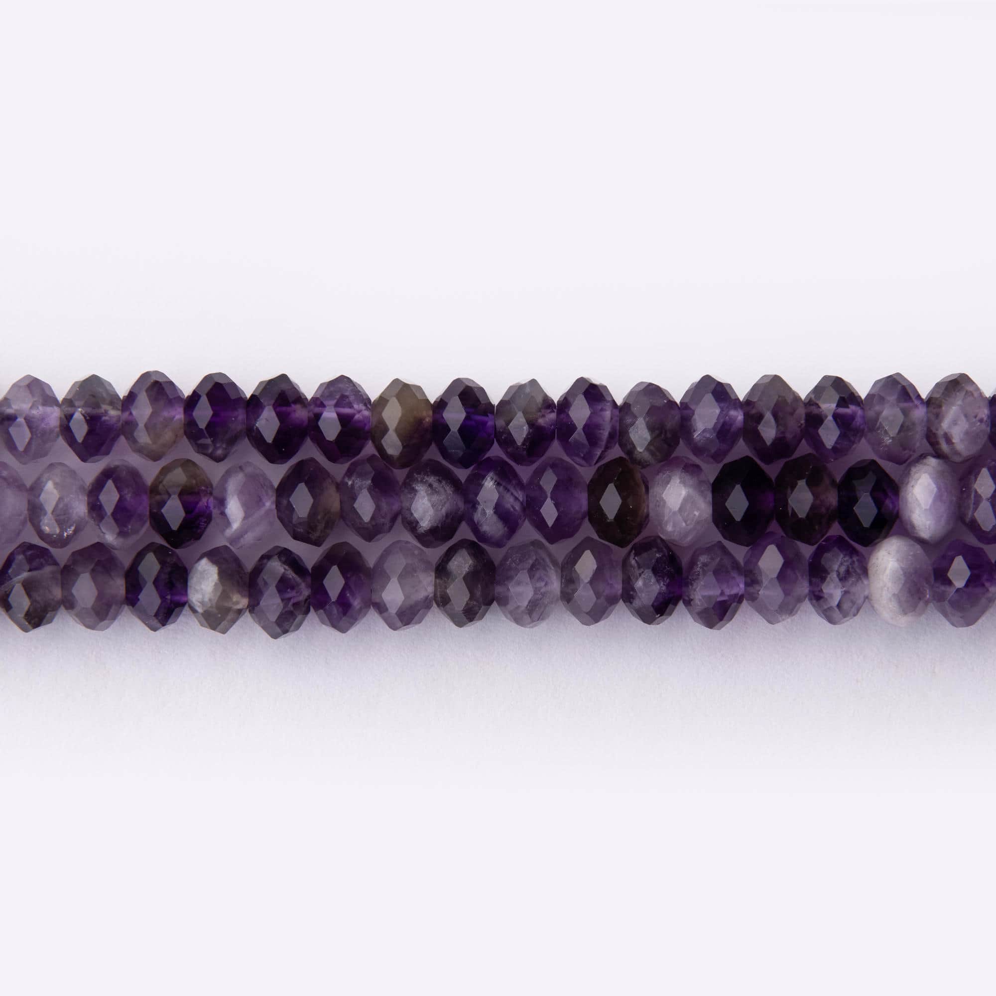02501 LQ Amethyst Natural Stone 4×6mm Lentil Faceted - Image 1