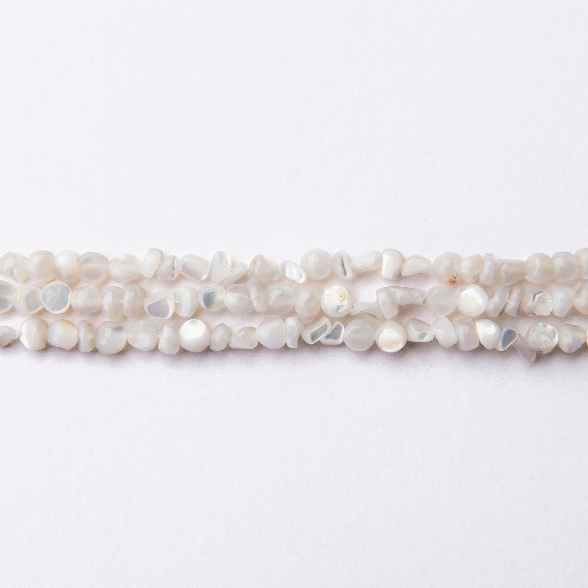 03246-LQ Natural White Shell 5mm Irregular Polished - Image 1